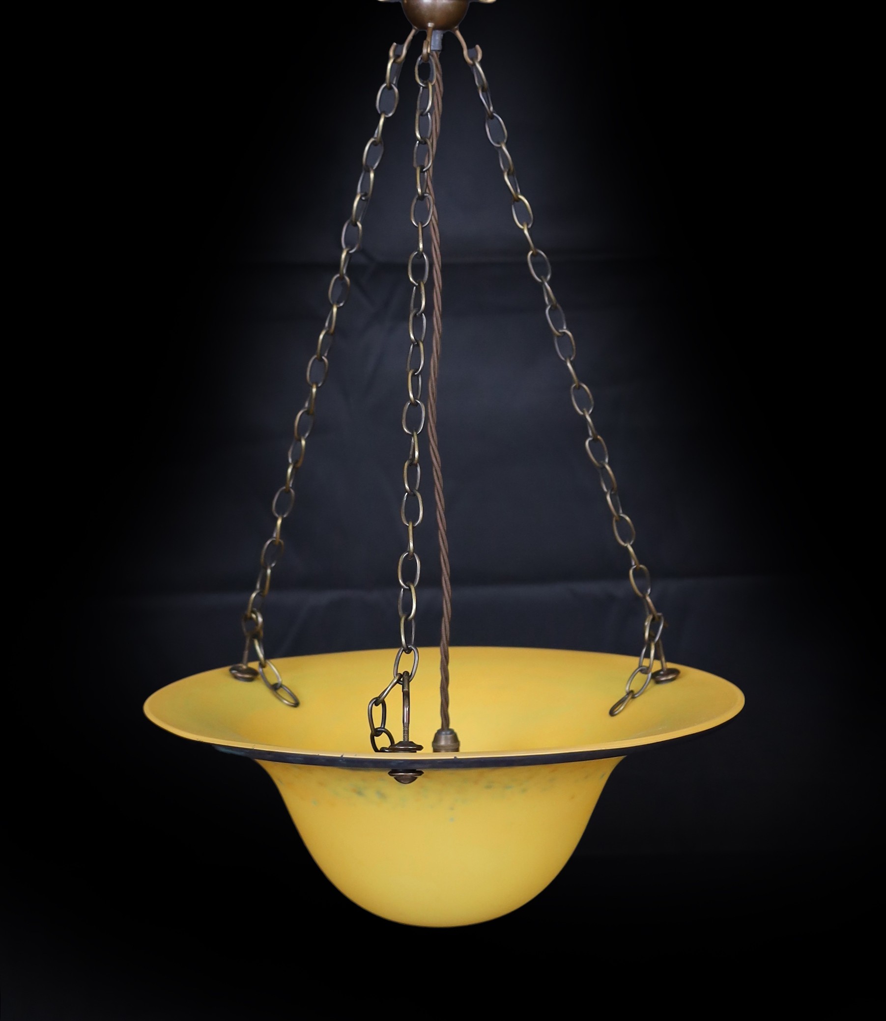 A 1930s style marbled glass light bowl with bronze chains and rose, drop 62cm, width 34cm